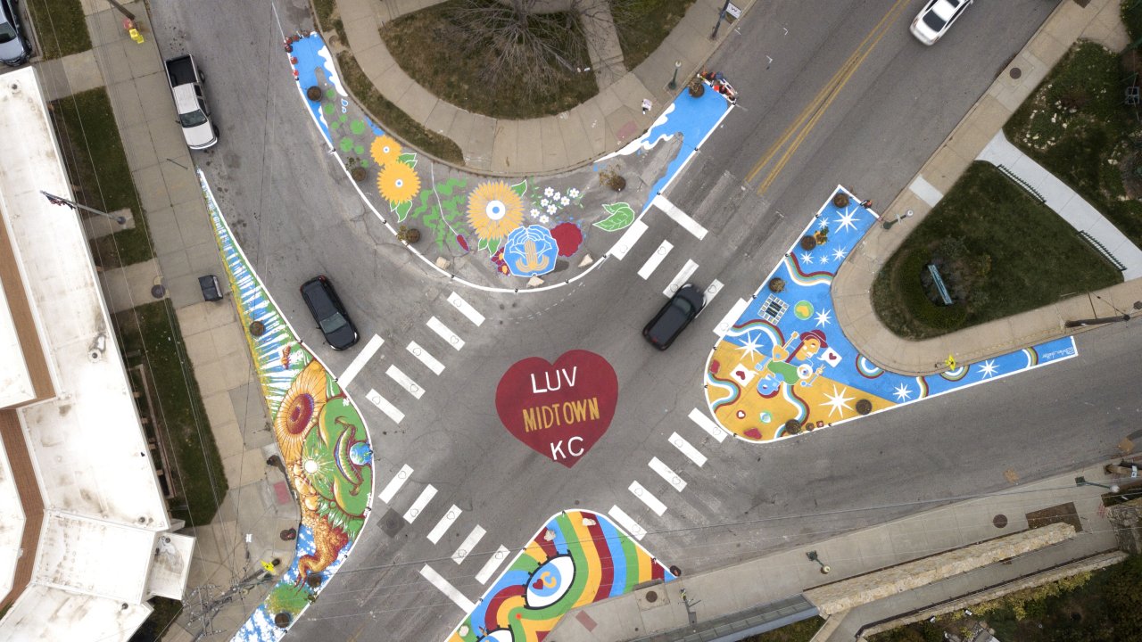 The Asphalt Art project in Kansas City, Missouri. The sidewalks got extended and crossing distances got shortened. After installing the art work, the people felt more safe crossing the street. 