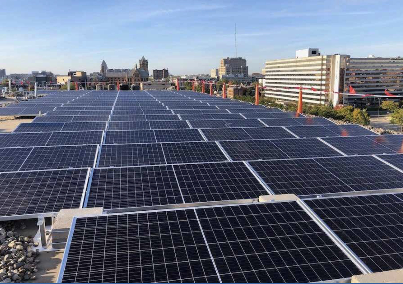 The 67 cities in this report have added more than 1,500 megawatts (MW) of solar in the past two years. In 2014, eight cities had more than 50 watts of solar capacity per resident installed; now, 34 cities exceed that threshold. Pictured, Solar on a former Jeep factory in Detroit. Photo credit, design and construction by Michigan Solutions of Commerce Michigan.