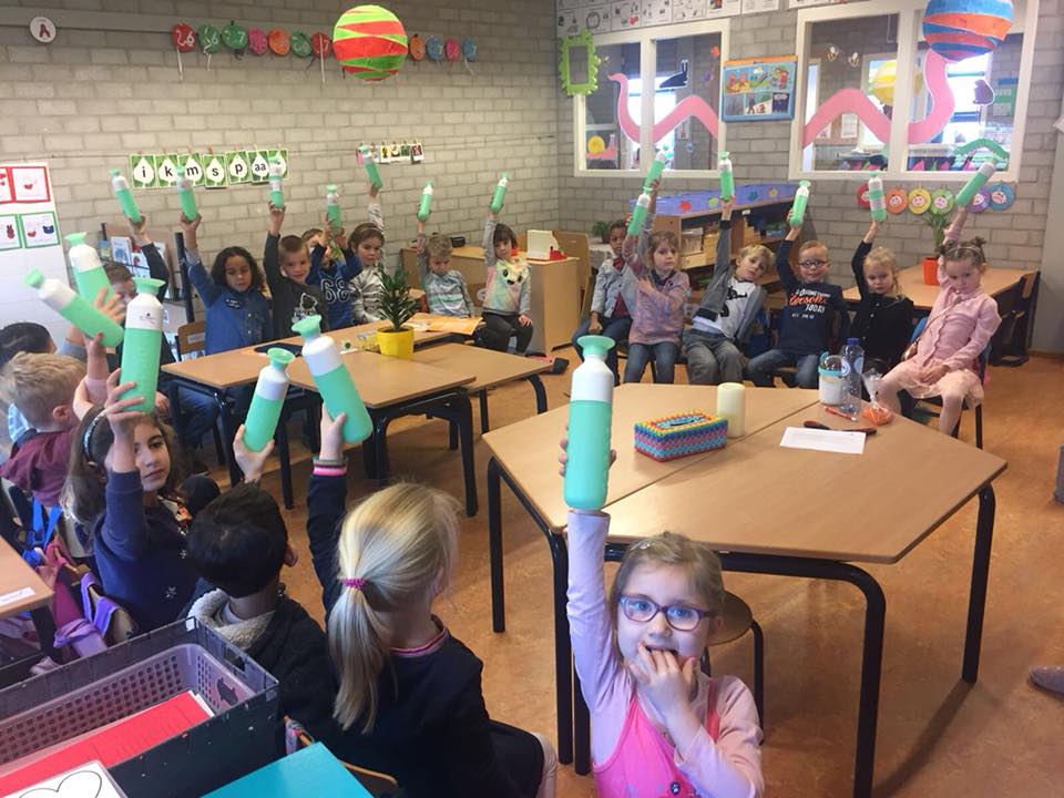 This school encourages children to drink water. They have all been given a 'dopper' ; e reusable plastic bottle to keep refilling with water for a healthy lifestyle.