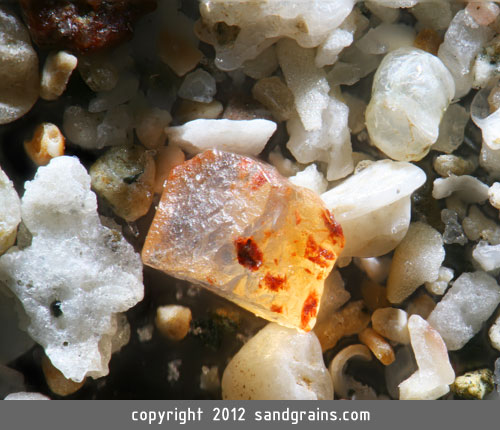 A grain of sand from Tamarindo Beach, Costa Rica, is made of chabazite, a glassy cubic mineral.