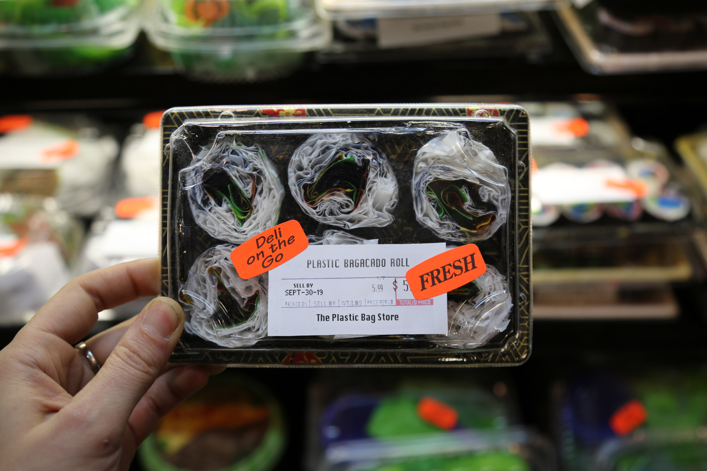 Shelves will be stocked with thousands of original, hand-sculpted items — produce and meat, dry goods and toiletries, cakes and sushi rolls —  all made from discarded, single-use plastics in an endless flux of packaging.