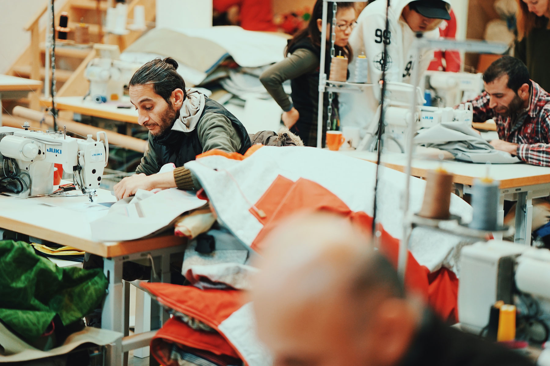 A social clothing factory where garments are made under ethically responsible working conditions. The expansion of the Sheltersuit organisation comes after a relocation to a new office building and larger production facility within the city of Enschede in the Netherlands.