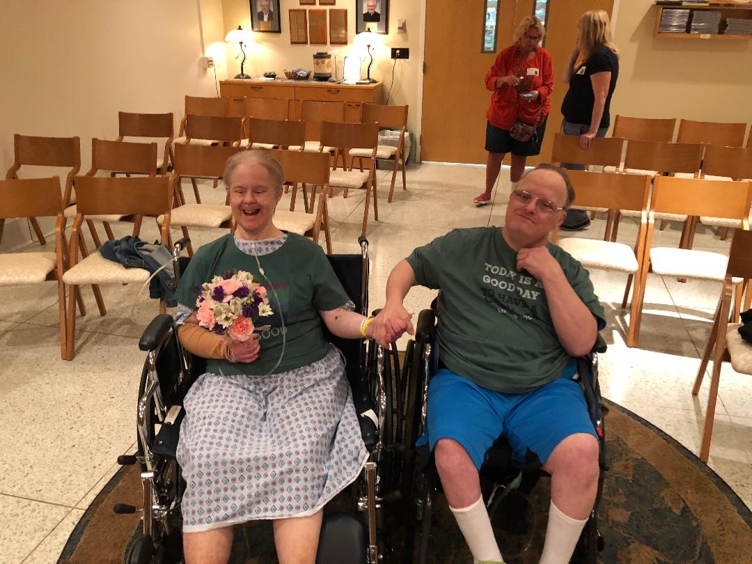 Last summer, Kris was recovering from pneumonia when Paul stopped to see her on their Aug. 13 Silver Wedding Anniversary at Upstate University Hospital in Syracuse. They were both in wheelchairs when they renewed their marriage vows in the hospital chapel.