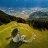 Artist creates giant Alpine fresco inspired by COVID-19 crisis