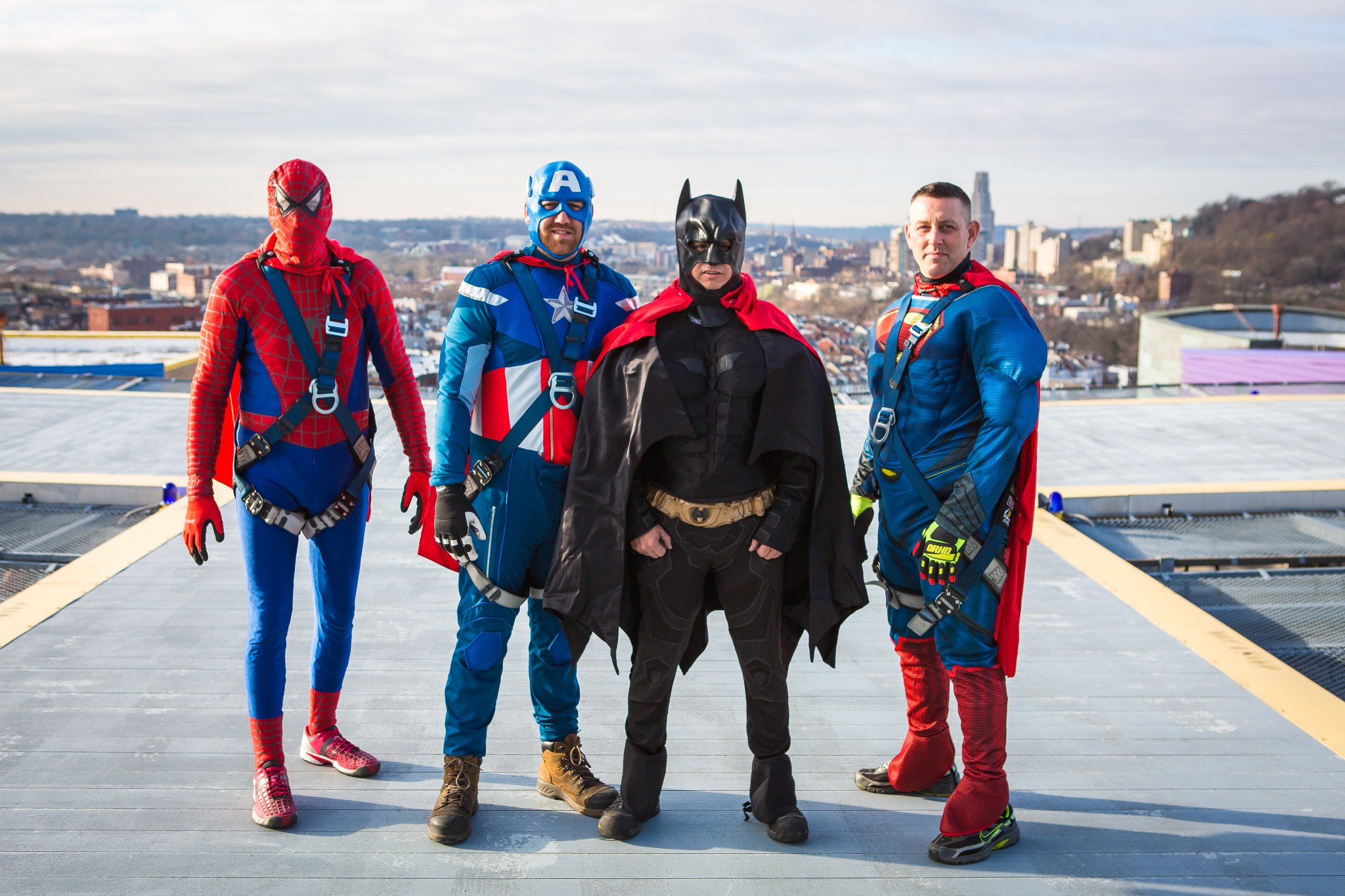 Rick Bollinger as Spiderman, Edward Hetrick as Captain America, Jim Zaremba as Batman, and Steve Viray as Superman.