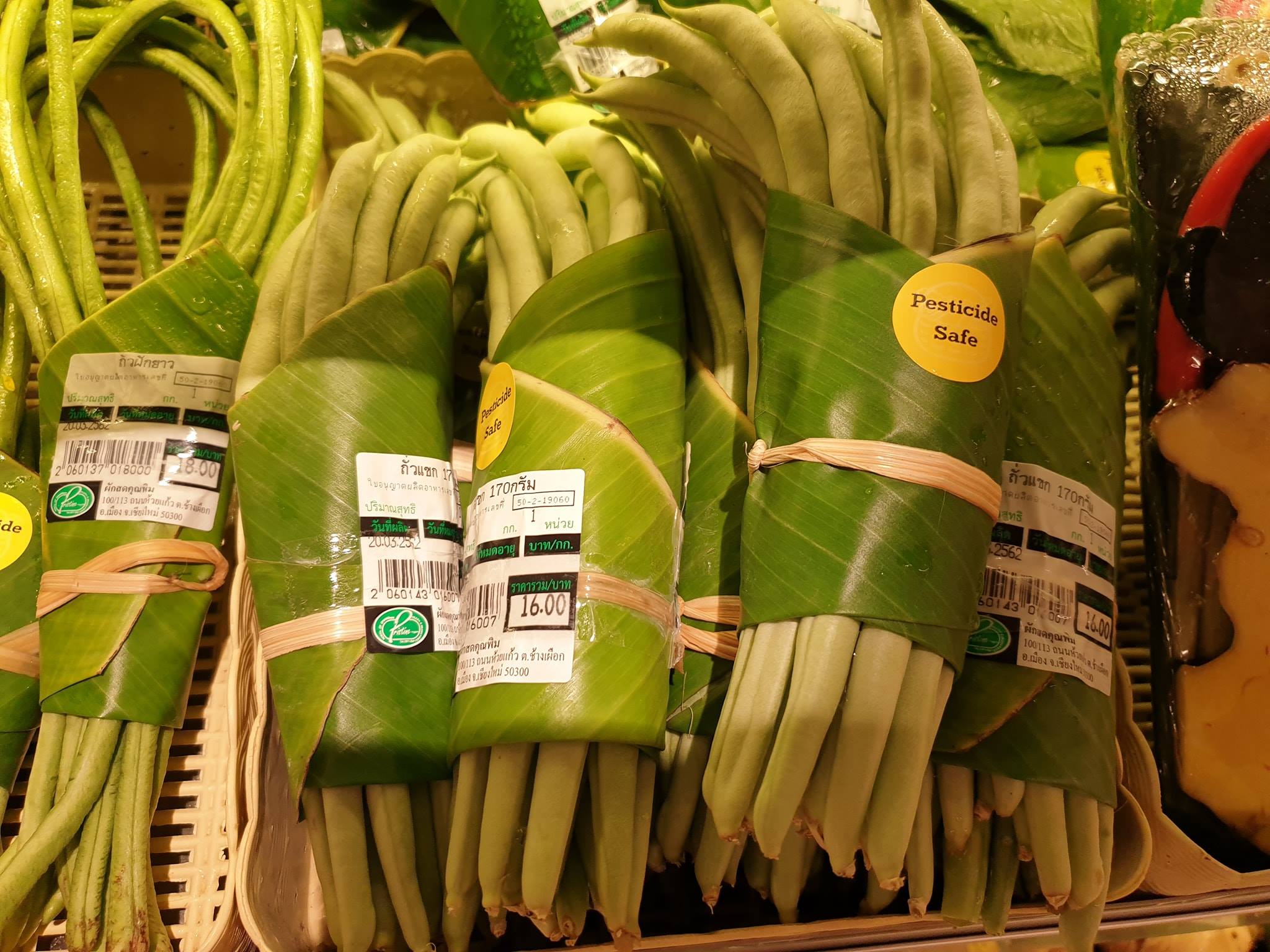 In more temperate locations the use of banana leaves could be significantly more expensive than plastic. However, using local biodegradable products could be a good alternative in locations where bananas don't grow.