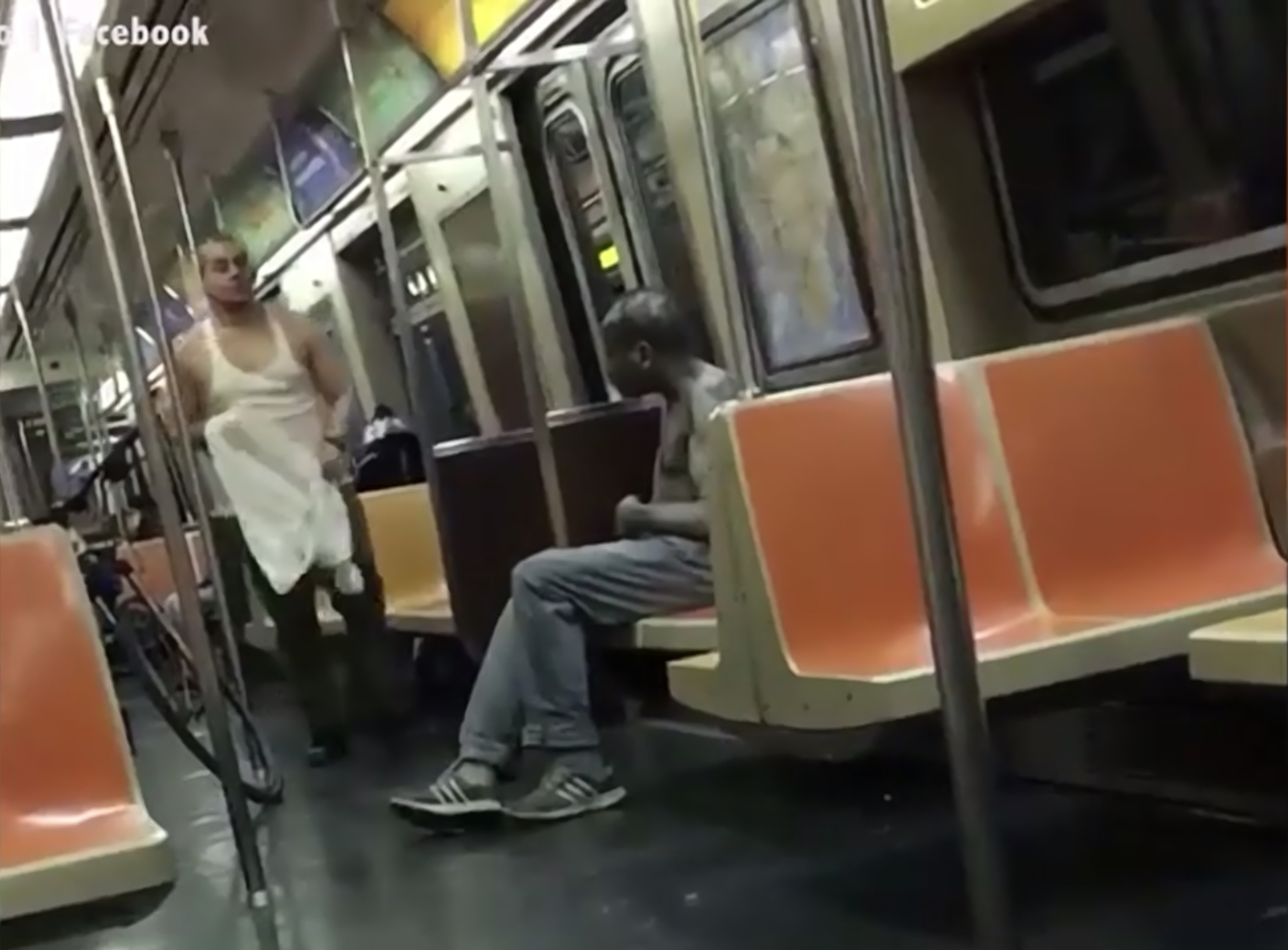 Not only did he take the shirt off his back and offer it to the man, he helped him put it on, looping the man's raised hands through the shirt's armholes.