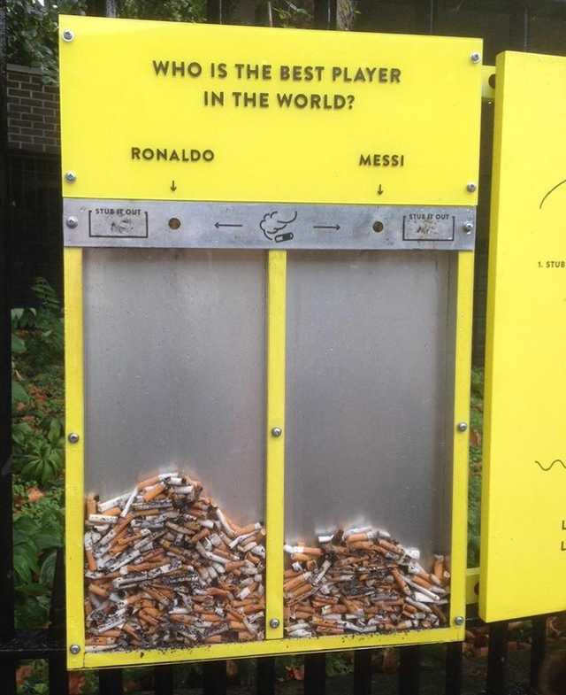 This receptacle at an unknown location (possibly a football stadium) encourages smokers to vote for their favourite player with their cigarette butts, stopping the poisonous and virtually indestructible trash ending up on the ground and in the environment.
