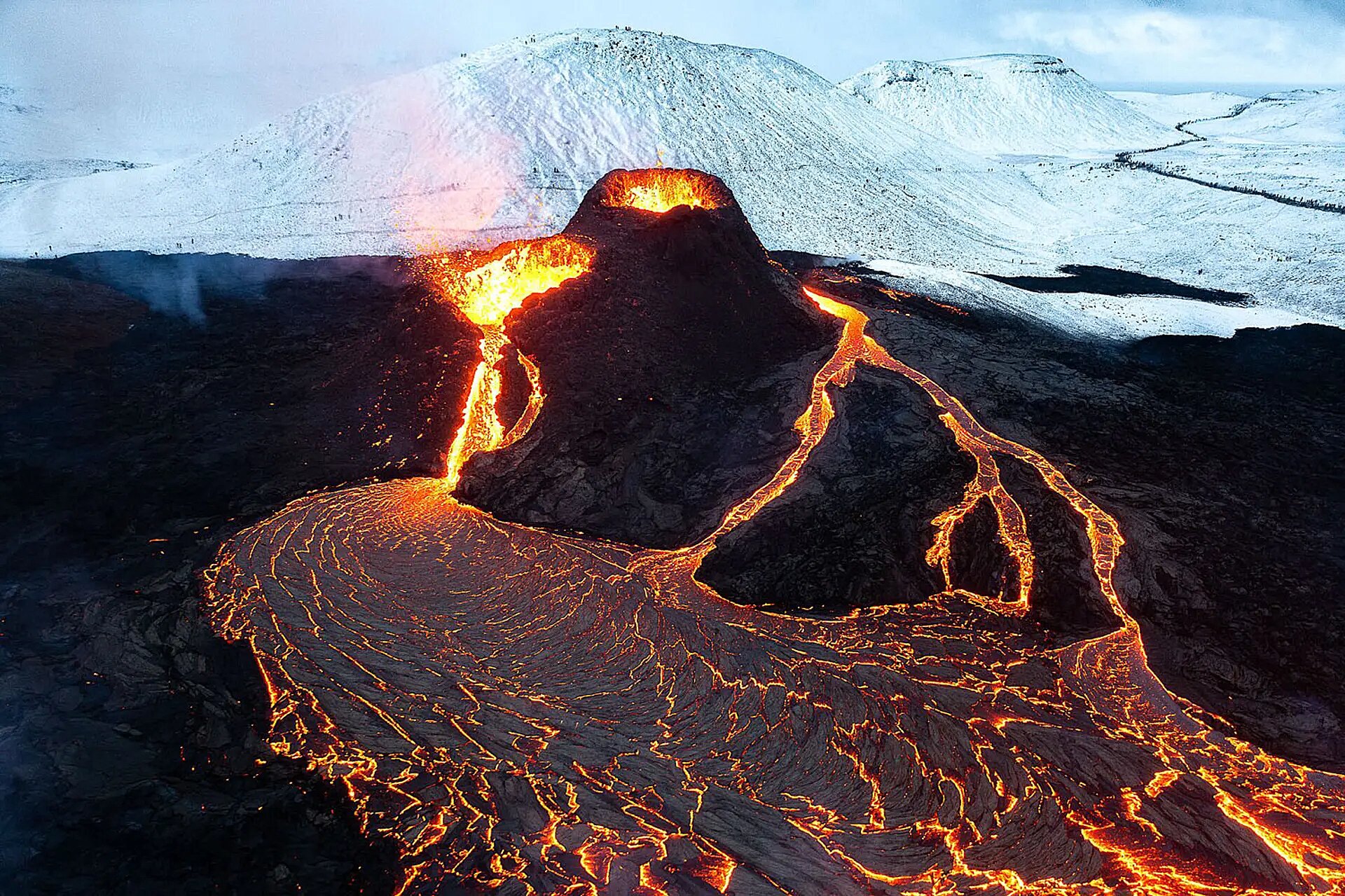 ‘Since the morning of its eruption, the airspace around Iceland’s newest volcano has been buzzing with small planes, helicopters and drones. From the air, you can feel the heat rise up and hit you. It’s palpable and creates near-tropical conditions as the warm air contrasts with the cold wet air off the ocean.’ Chris Burkard is an explorer, photographer, speaker and author.