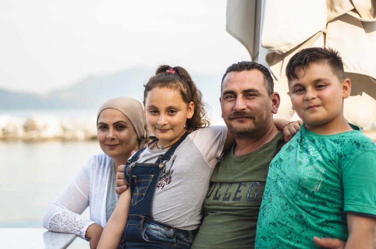 “One family we served contained 26 people - 3 generations, from 1 year old to 70 years old - all who share 2 tents inside Moria. Restoring this custom of eating around a table with their families is one of our biggest pleasures.”