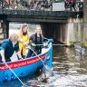 Tourists can now go fishing for plastic in the canals of Amsterdam