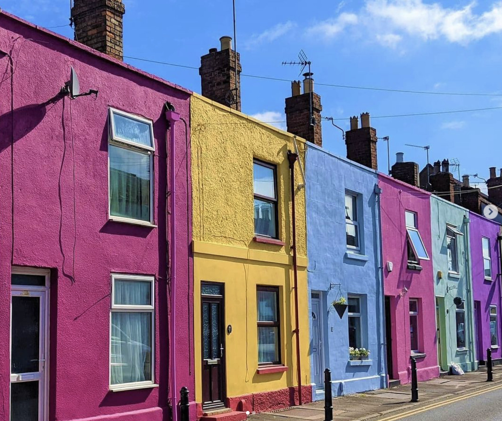Las coloridas hileras de casas se convirtieron en la marca registrada de Tash, haciendo de esta parte de la ciudad conocida como la 