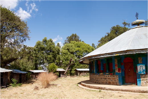 The structures at the clearing’s perimeter serve as mahabir houses or housing for nuns and monks.