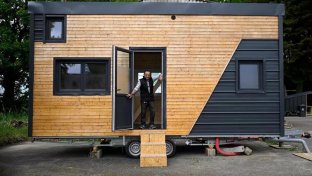 Building &#8216;tiny homes&#8217; gives French homeless people practical skills and a place to live