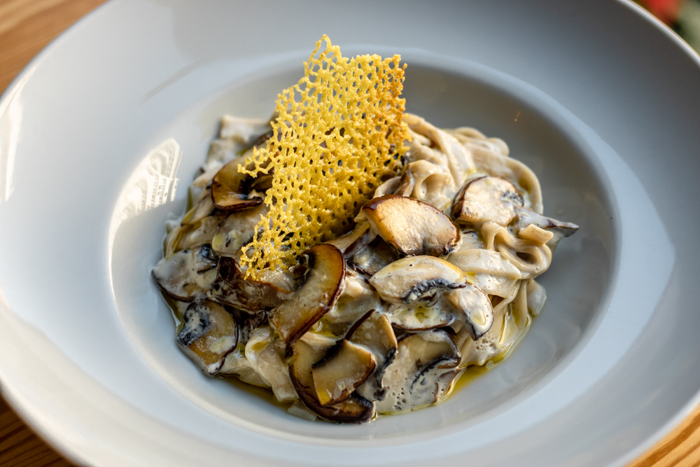 Including this home-made taglierini with mushrooms, soy cream and turmeric coral.