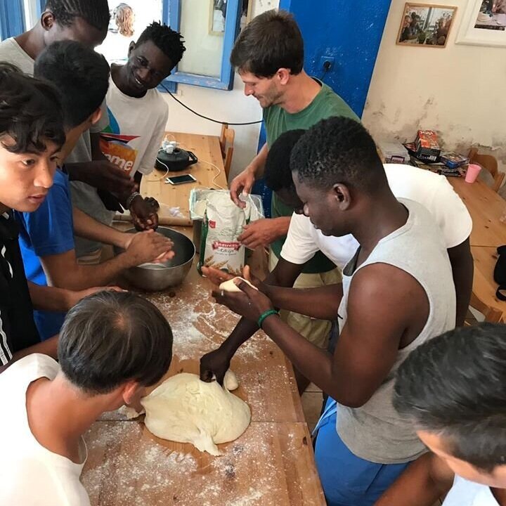 Unaccompanied minors arrived on Lesbos without a parent or guardian, and are under 18 years old. They stay in supervised accommodations in the camp, and visit HOME with government security staff. “We serve them food and create activities for them to give them a break from their everyday life inside the camp.” https://homeforall.eu/who-we-serve