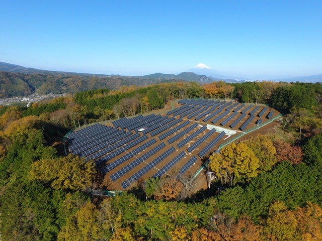 In 8 months of operation, over 1000 trees worth of CO2 was absorbed. Mt Fuji (a World Heritage Site) is visible from the drone but not from the site and vice versa.This plant was built to address climate change due to human induced global warming, and to decrease nuclear reactors after Fukushima.