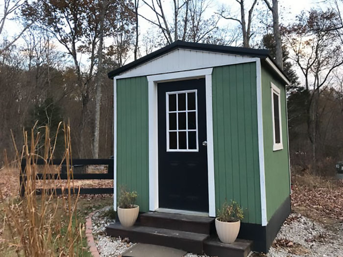 This 64-square-foot building serves as the family’s private office, allowing mom Keli and her husband to work from home. The Brinkses pay less than $200 in utilities, less than at their home in Michigan. Keli and her husband each have multiple jobs, and sometimes they use this tiny office to work from home.