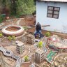 This self-taught designer from South Africa built a city in his backyard – from trash