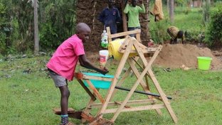 Kenyan schoolboy honoured by president for innovative hand washing machine