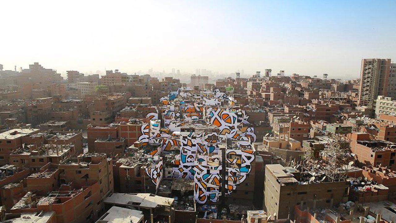 This mural spanning 50 buildings in Cairo contains a hidden message