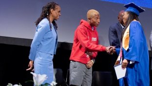 Graduating class of NYC high school students receive life-changing gift from Pharrell Williams
