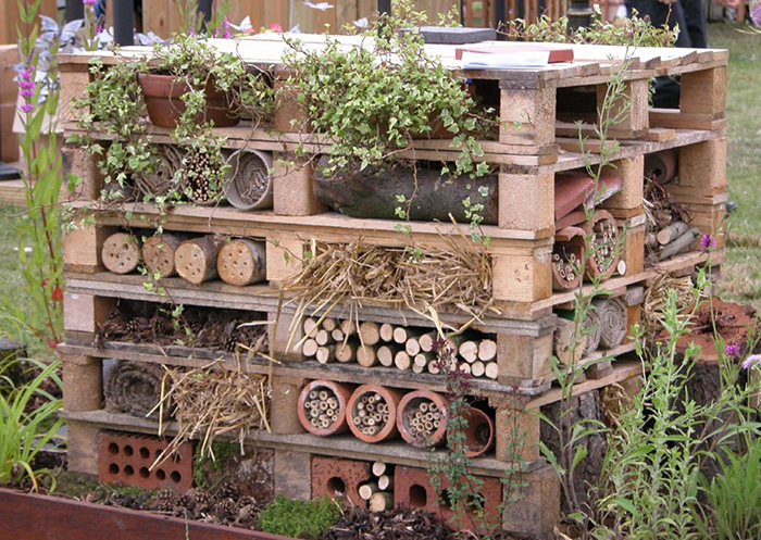 This would be another fun DIY project using upcycled pallets, bricks, wood, and other materials you might already have lying around your property.