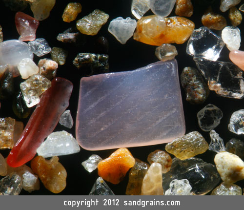 A square-shaped shell fragment is found amidst sand from Masaya, Nicaragua (magnification 80 times)