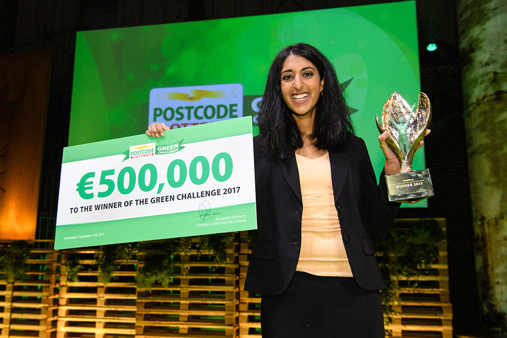 Gayati Datar, the co-founder and CEO of EarthEnable accepts the prize they won at the postcode lottery's green challenge 2017.