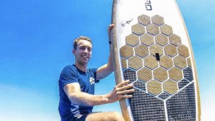World class surfboard and paddle parts made from discarded fishing nets is now a reality