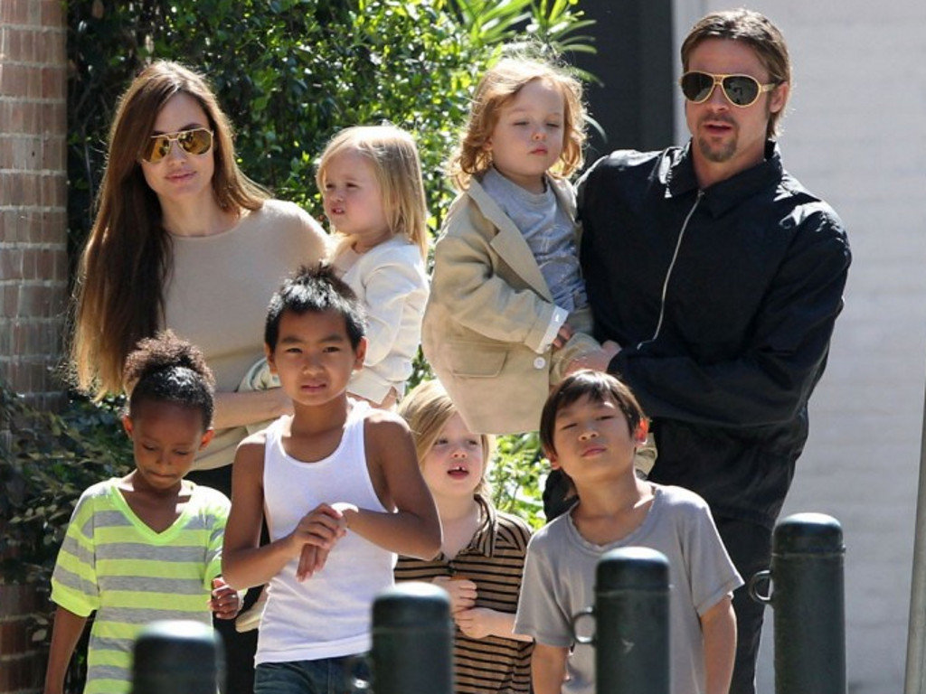 With her, then husband, Brad Pitt and their six kids