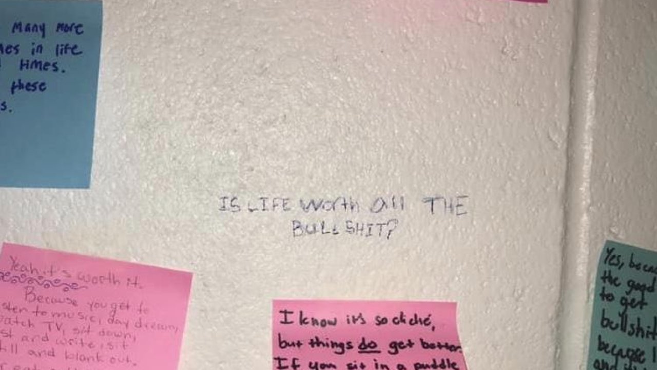 When student writes bleak message on restroom wall, classmates respond