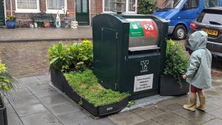 Amsterdam is planting mini-gardens around trash cans with hopes to cut littering